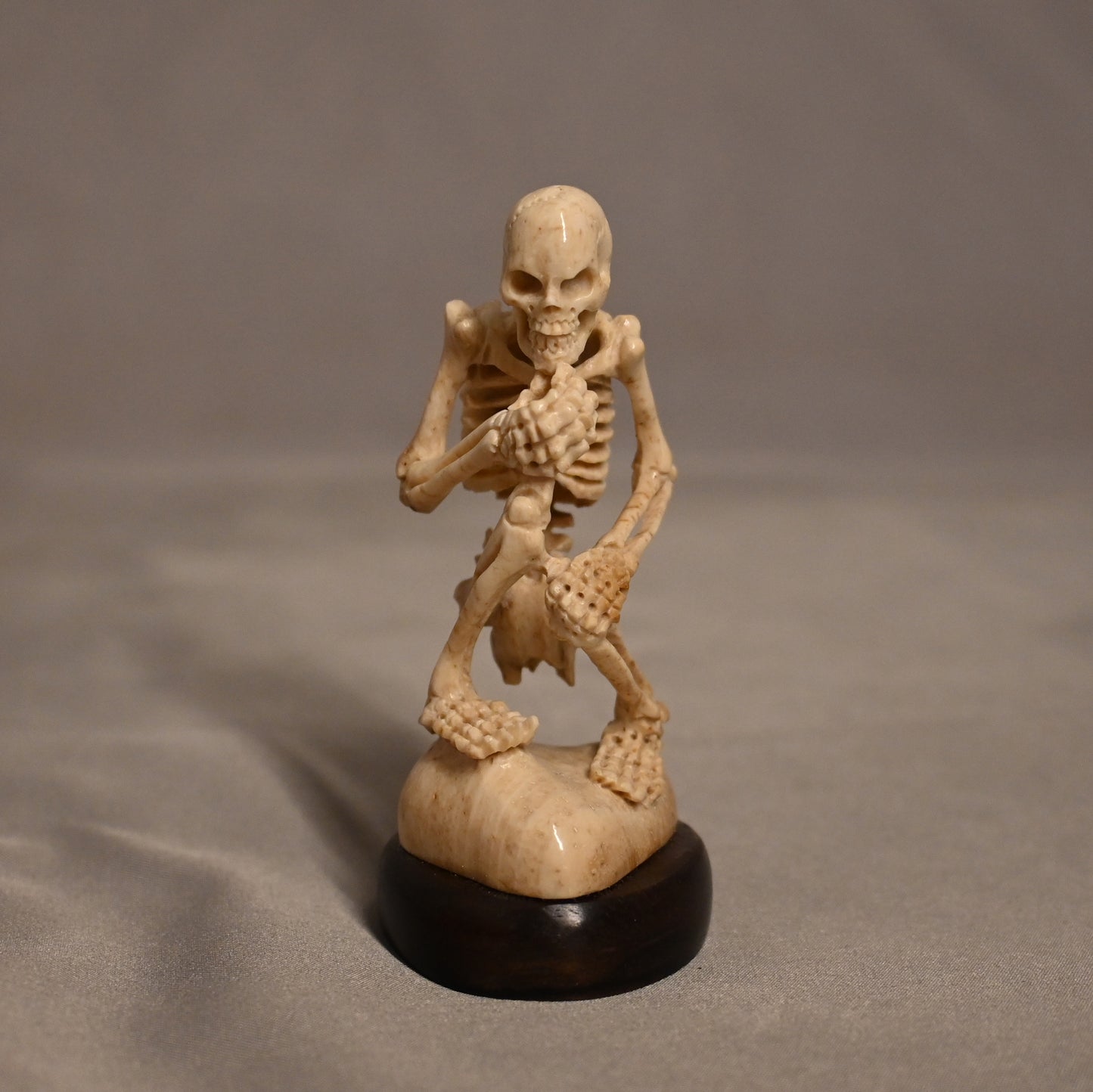 Bone Carved Thinking Skeleton