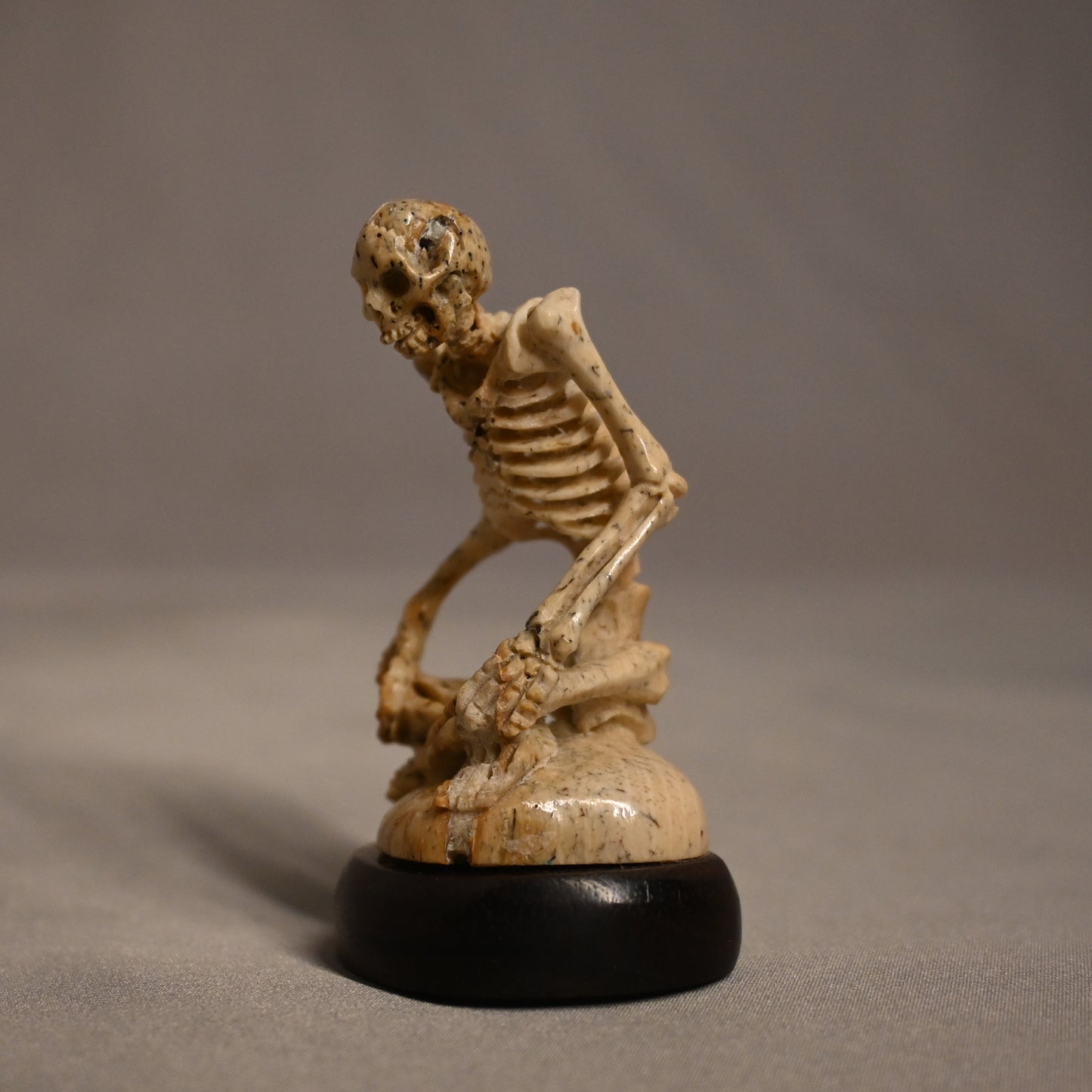 Bone Carved Skeleton Sitting