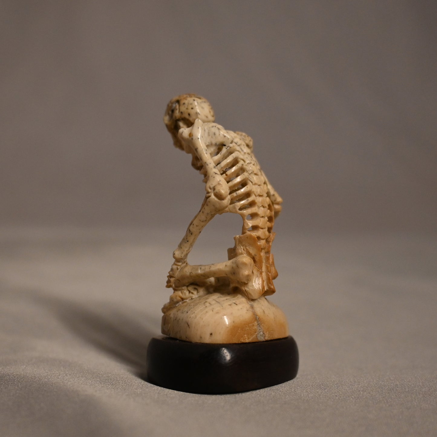 Bone Carved Skeleton Sitting