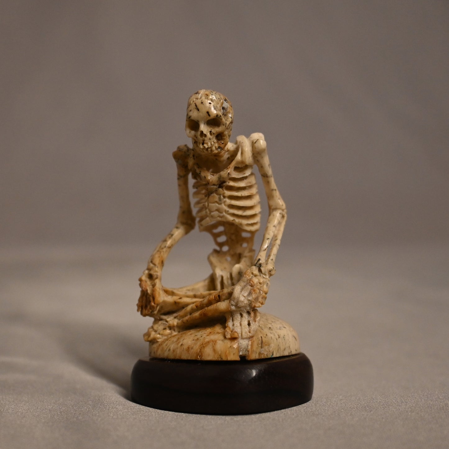 Bone Carved Skeleton Sitting