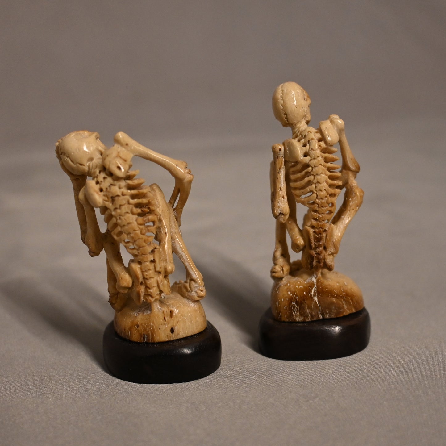 Carved Bone Skeletons Pair Sitting 2