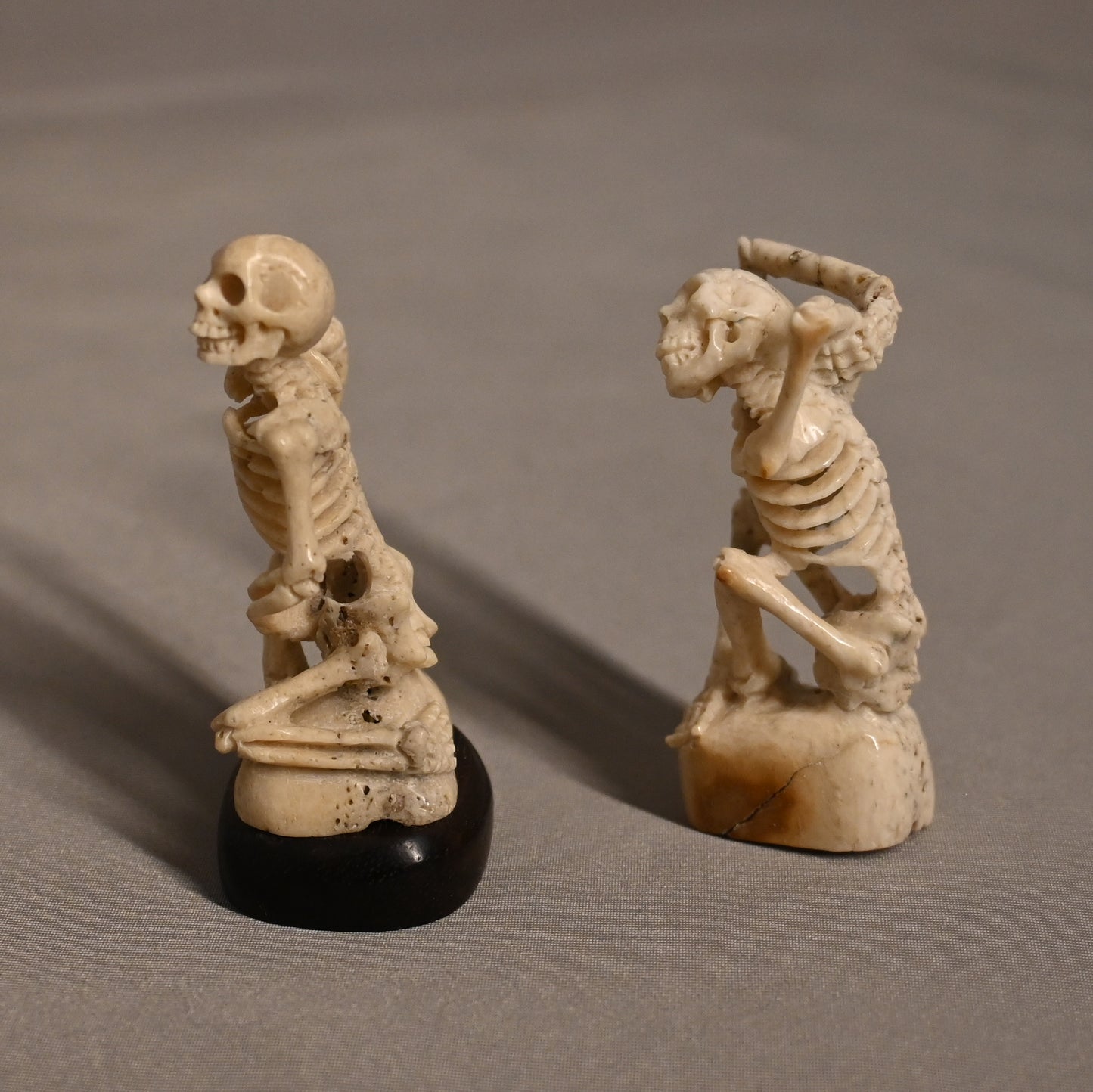 Carved Bone Skeleton Pair Sitting