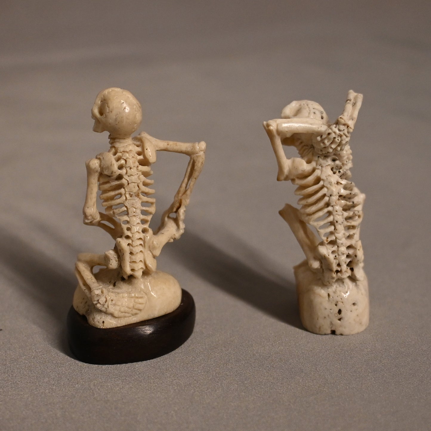 Carved Bone Skeleton Pair Sitting