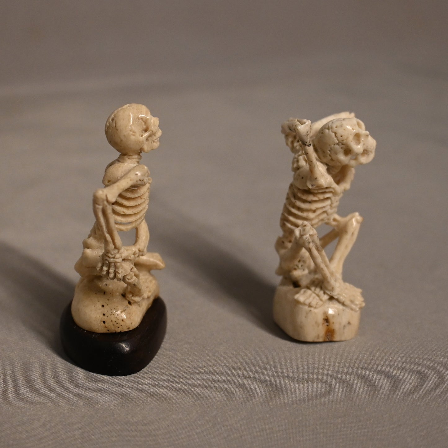 Carved Bone Skeleton Pair Sitting