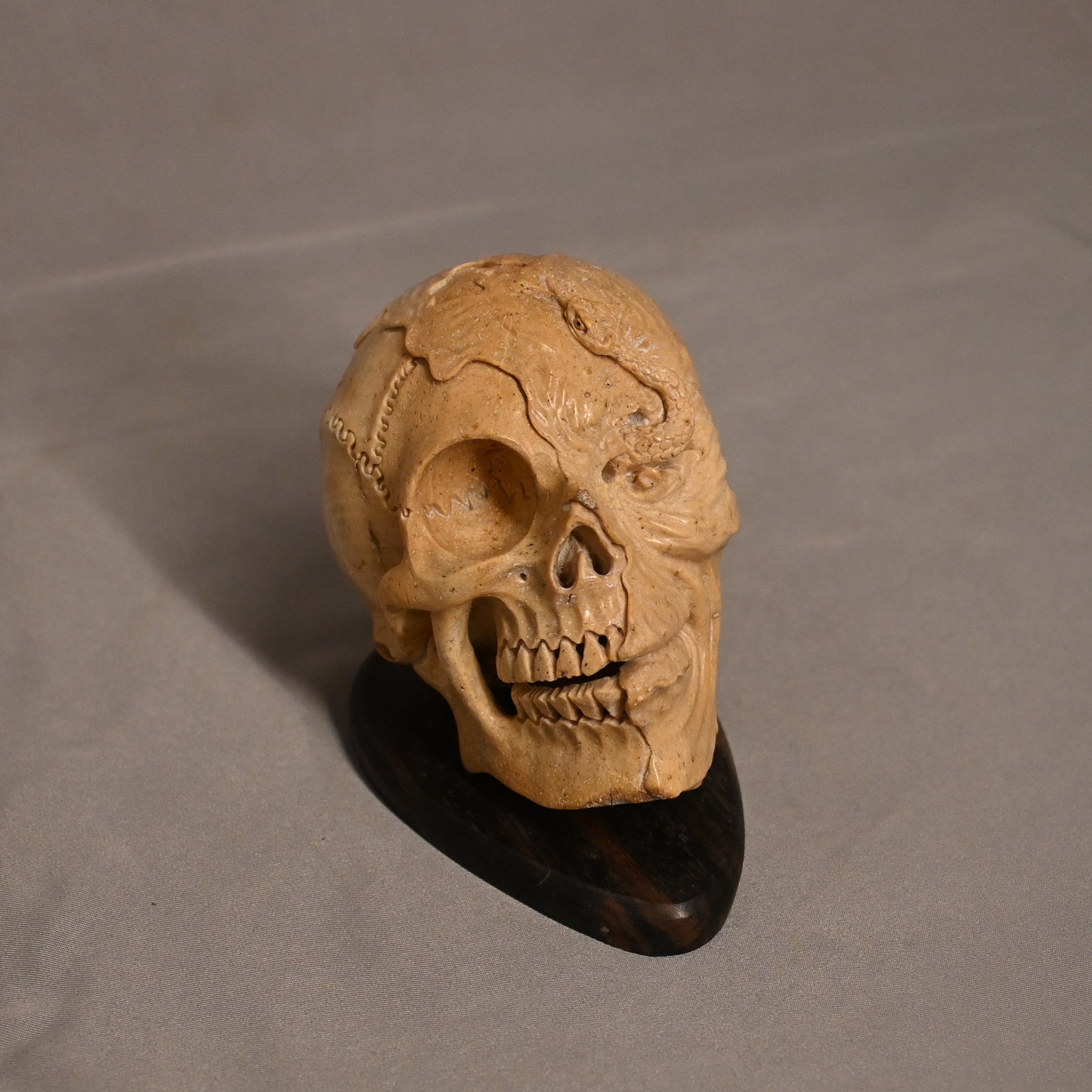 Bone Carved Skull with Snake