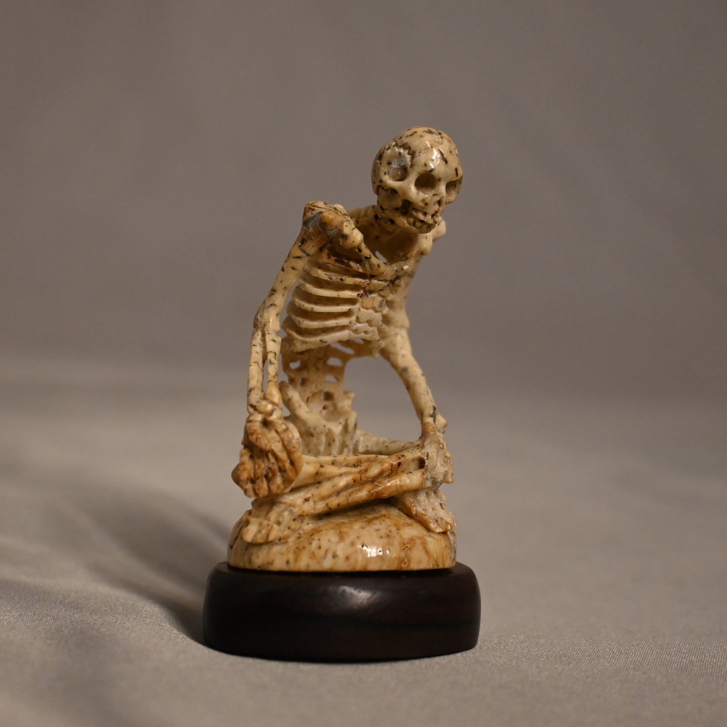 Bone Carved Skeleton Sitting