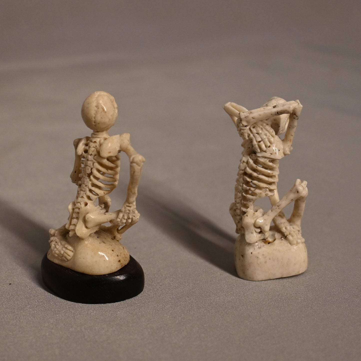 Carved Bone Skeleton Pair Sitting